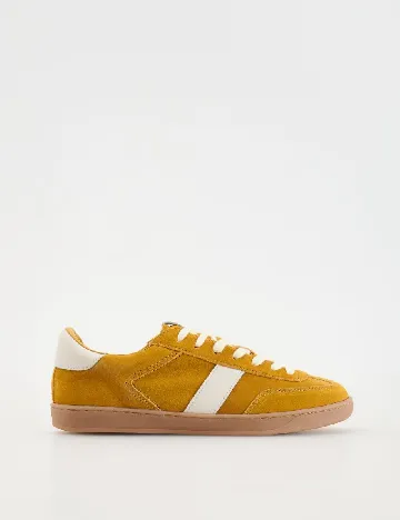 Adidasi Reserved, mustar